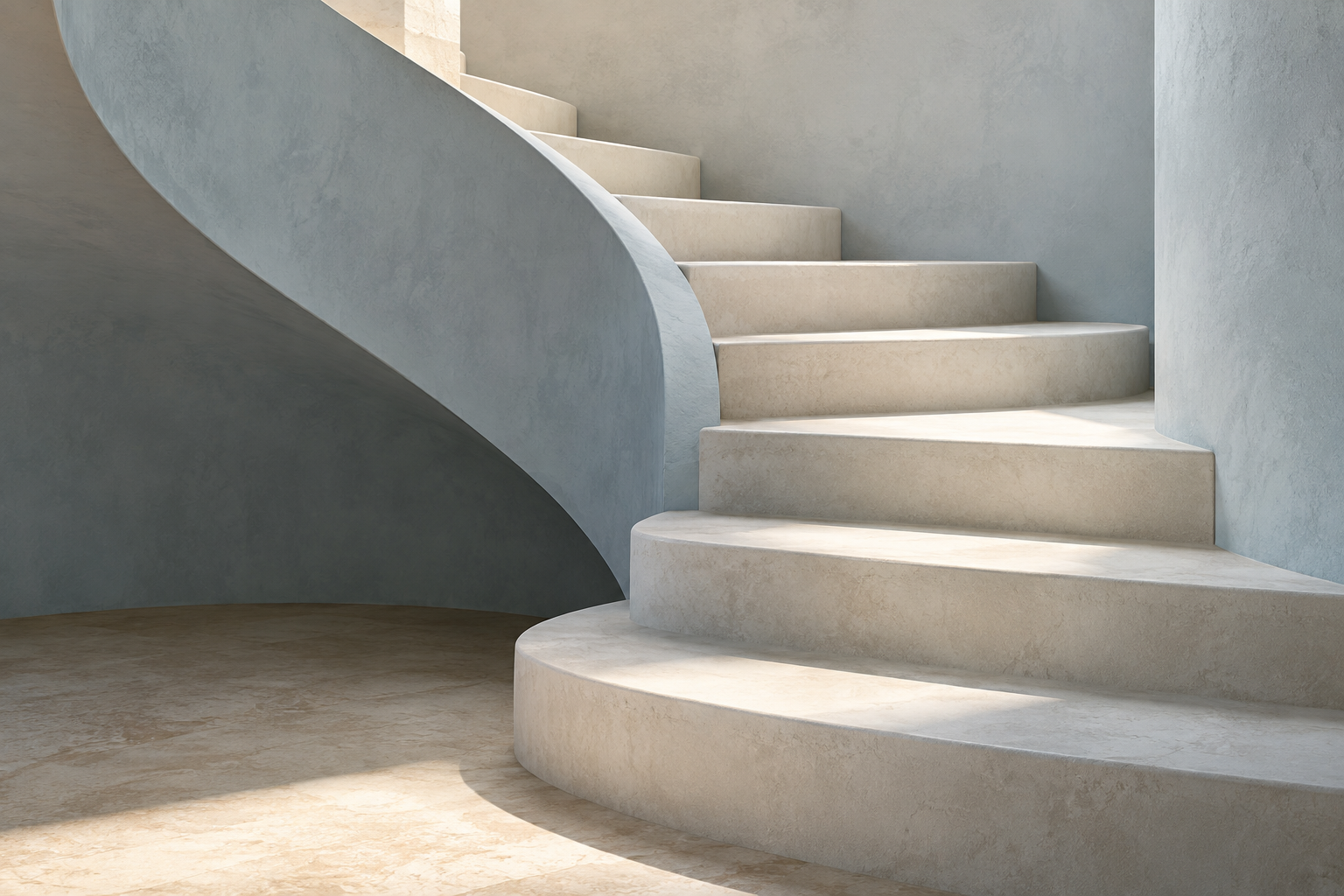 Curved plaster staircase in natural light